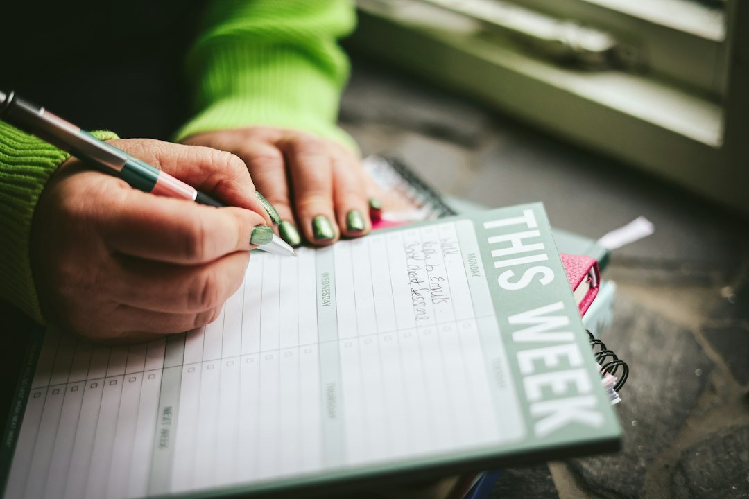 Business owner planning a marketing routine for busy local businesses.